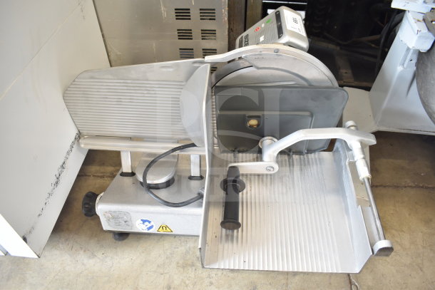 Bizerba VS12F commercial meat and cheese slicer, countertop model, 120 volts, 1 phase, in well-used condition with visible labels.
