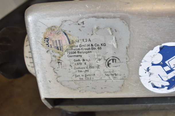 Bizerba VS12F commercial meat slicer label showing electrical specs and compliance marks; label is worn.