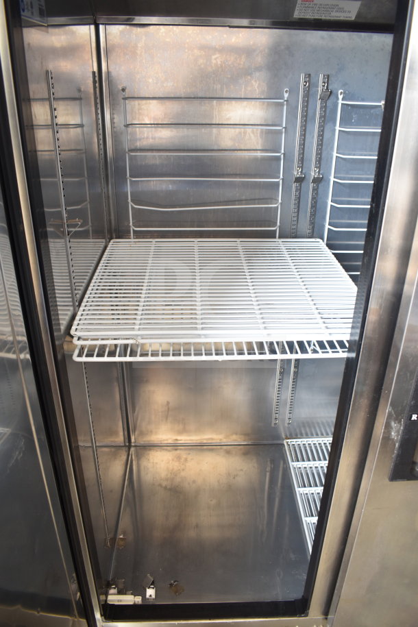 Everest ESR2 Commercial 2 Door Reach-In Cooler, stainless steel, on casters, 115 volts, 1 phase, interior shelving visible.