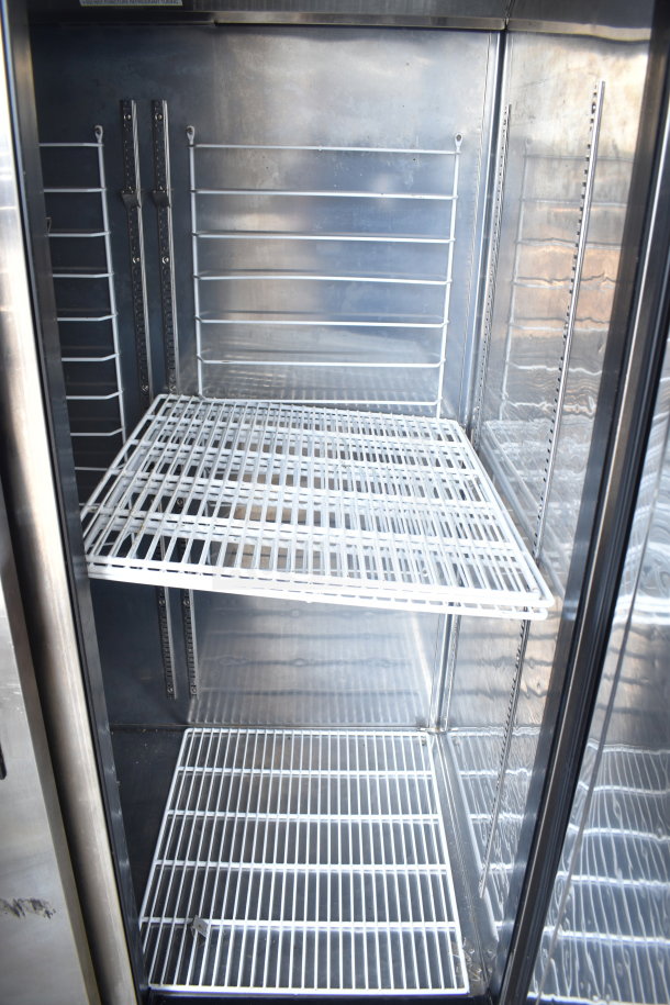 Everest ESR2 Commercial 2 Door Reach-In Cooler with adjustable shelves, stainless interior, on casters. 115V, 1 Phase.