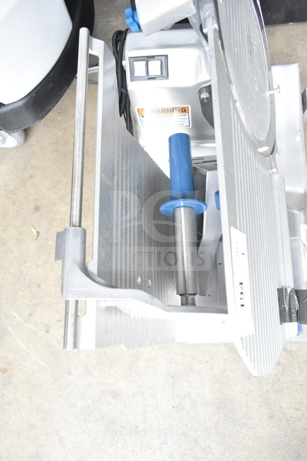 Edlund EDV-12 commercial meat slicer with blade sharpener, requires carriage reattachment, 120V, countertop model.
