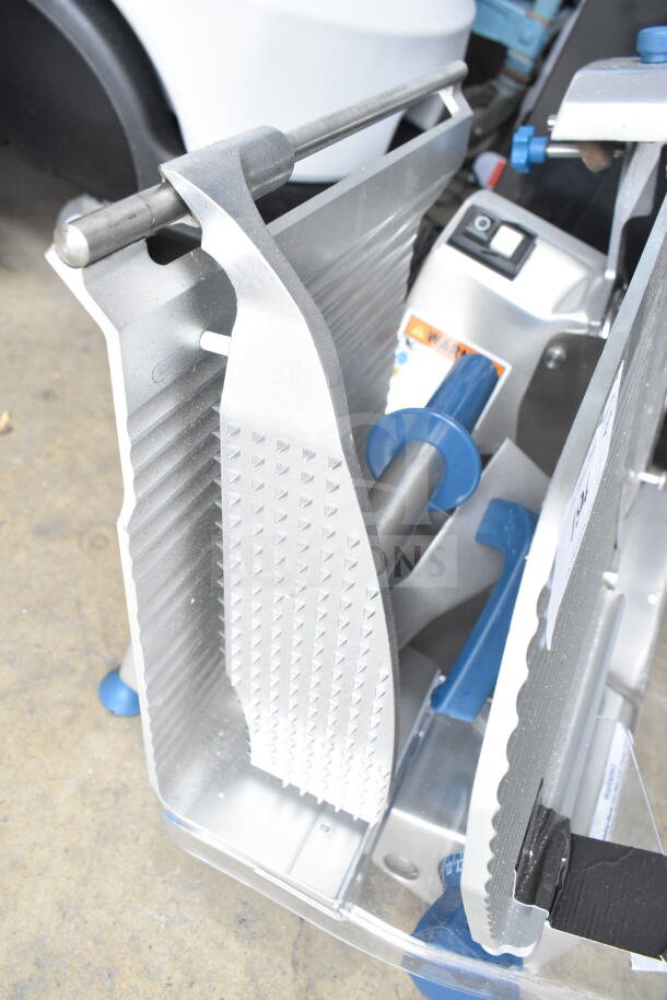 Edlund EDV-12 commercial meat slicer with blade sharpener, needs carriage reattachment, 120V, 1 phase, metal construction.
