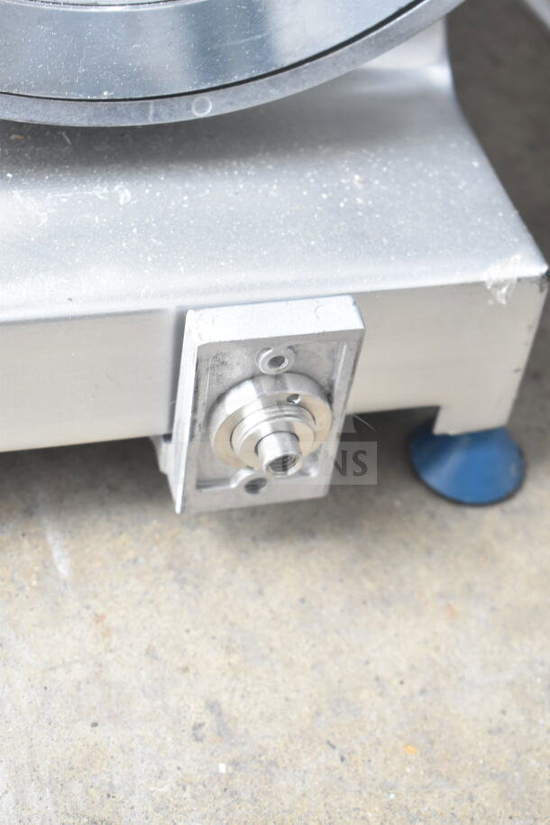 Edlund EDV-12 meat slicer component; needs carriage reattachment. Stainless steel, includes blade sharpener. 120V, 1 phase.