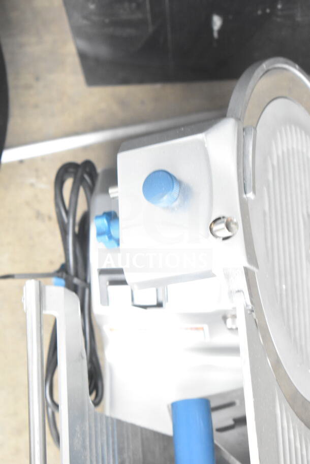 Edlund EDV-12 meat slicer with blade sharpener, requires carriage reattachment, 120V, 1 phase, commercial use.