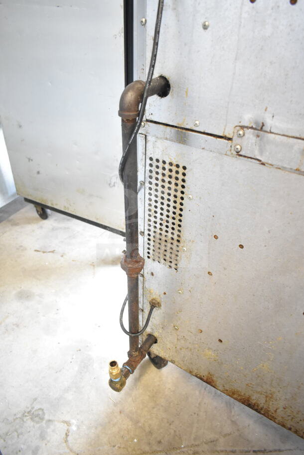 Southbend Marathoner Gold commercial gas convection oven, half size, view door, thermostatic controls, on casters, rust visible.