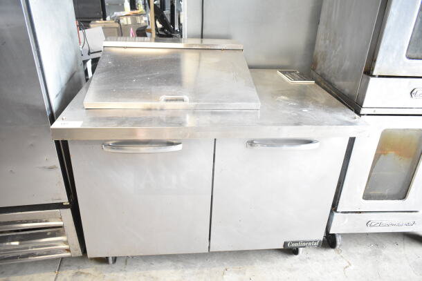 Continental SW48N12M commercial sandwich salad prep table, mega top, on casters. Stainless steel, 115V, 1 Phase.