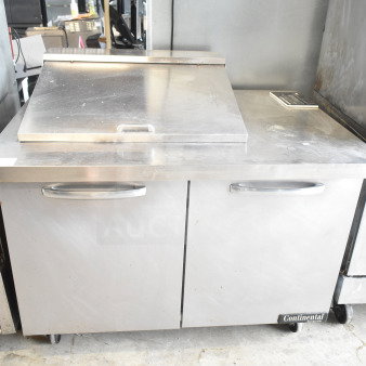 Continental SW48N12M commercial sandwich salad prep table, mega top, on casters. Stainless steel, 115V, 1 Phase.