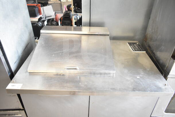 Continental SW48N12M commercial salad prep table with Bain Marie mega top, stainless steel, on casters, 115V, 1 phase.