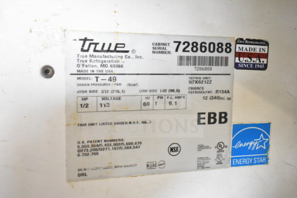 Label on True T-49 Cooler, showing model, voltage 115, phase 1, refrigerant R134A, and Energy Star certification. Made in the USA.