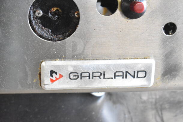 Garland Commercial Countertop Gas Griddle, stainless steel, used condition, logo plate with brand marking visible.