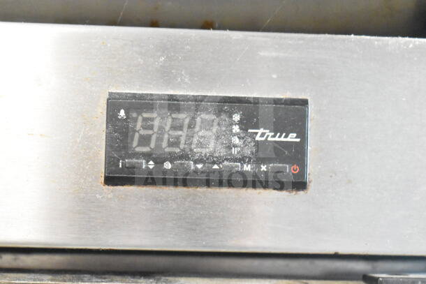 2017 True T-49 commercial reach-in cooler, digital display shown. Model T-49, 115 volts, 1 phase, visible wear.