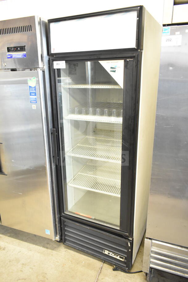 True GDM-23 commercial single door reach-in cooler merchandiser, 115V, 1 phase, glass door, metal shelves, used condition.