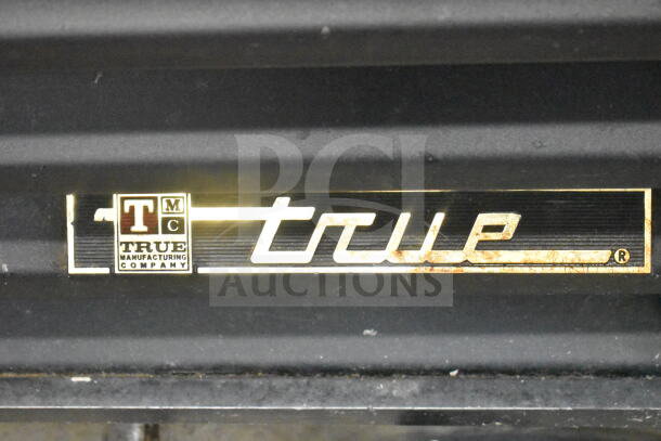 True GDM-23 single door cooler logo, showcasing brand detail, ideal for commercial use, 115 volts, 1 phase.