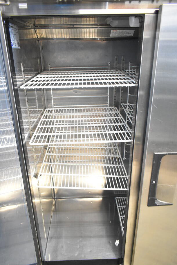 Everest ESR2 Commercial Reach-In Cooler, 2-door, 115V, 1-phase, multiple shelving units, stainless steel interior, excellent condition.