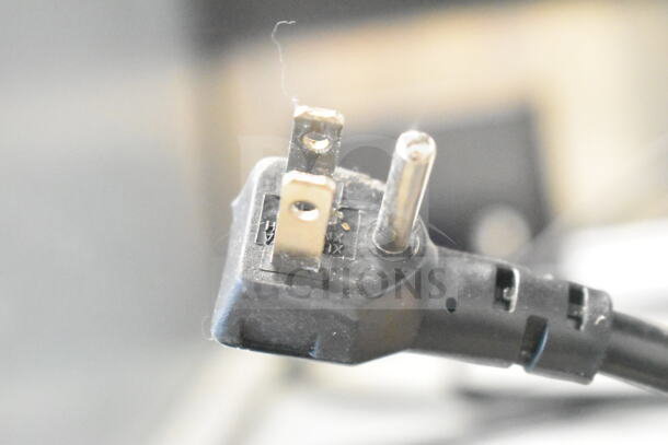 Close-up of a black electrical plug for the Everest ESR2 commercial 2-door reach-in cooler, 115 volts, 1 phase.