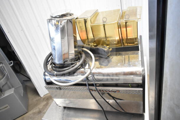 Thermoplan Mastrena stainless steel super automatic espresso machine with LCD display, hoppers, steam wand, 208V, 1 Phase.