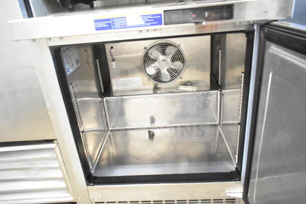 Everest ETBF1 commercial undercounter freezer, single door, on casters. Interior view, stainless steel, 115 volts, 1 phase.