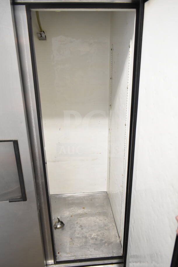 True T-49 Commercial 2 Door Reach In Cooler, 115V, Model T-35, stainless interior, good condition, minor wear visible.