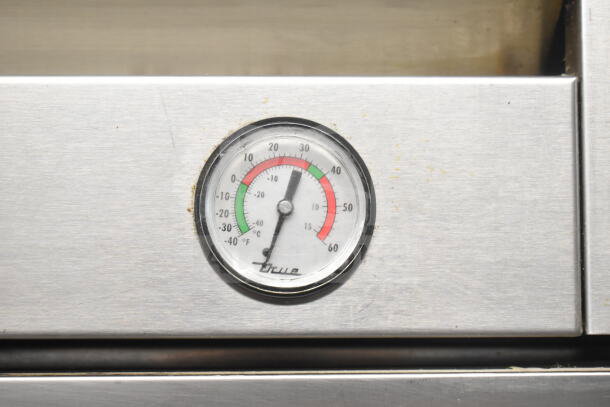 True T-49 Commercial 2 Door Reach In Cooler, thermometer on stainless steel exterior, model T-35, 115 volts.