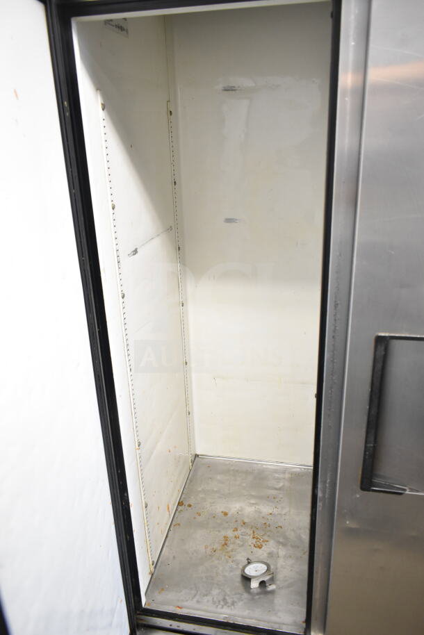 True T-49 commercial 2-door reach-in cooler, 115 volts, 1 phase, model T-35, stainless steel, interior scuffed, includes thermometer.