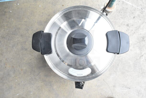 Brand new Avantco 65-cup stainless steel coffee urn, double wall, 110-120V, with minor scratches, top view.