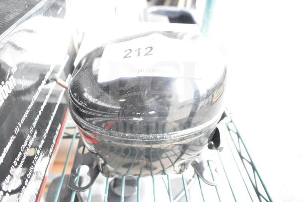 BRAND NEW Embraco EM2X3125U Avantco 17812325 Compressor. Scratch and dent. 115-127 Volts, 1 Phase. Black exterior.