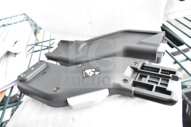 Brand new Uppababy Upper Adapters, scratch and dent condition, black, includes two adapters, visible safety labels.