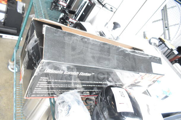 Brand new TableCraft BCD1400 condiment bar, 5 compartments, glass rimming trays. Scratch and dent condition, original box.
