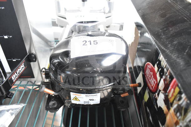 Brand new Cubigel NUT70NR Avantco 17817638 compressor, 115-127 volts, 1 phase. Scratch and dent condition, visible labels.