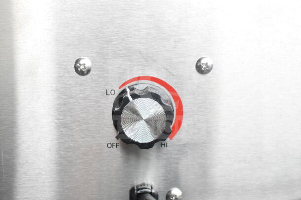 Close-up of Carnival King 382CDPW2 double cone dip warmer control panel with temperature dial, marked "Lo" to "Hi."
