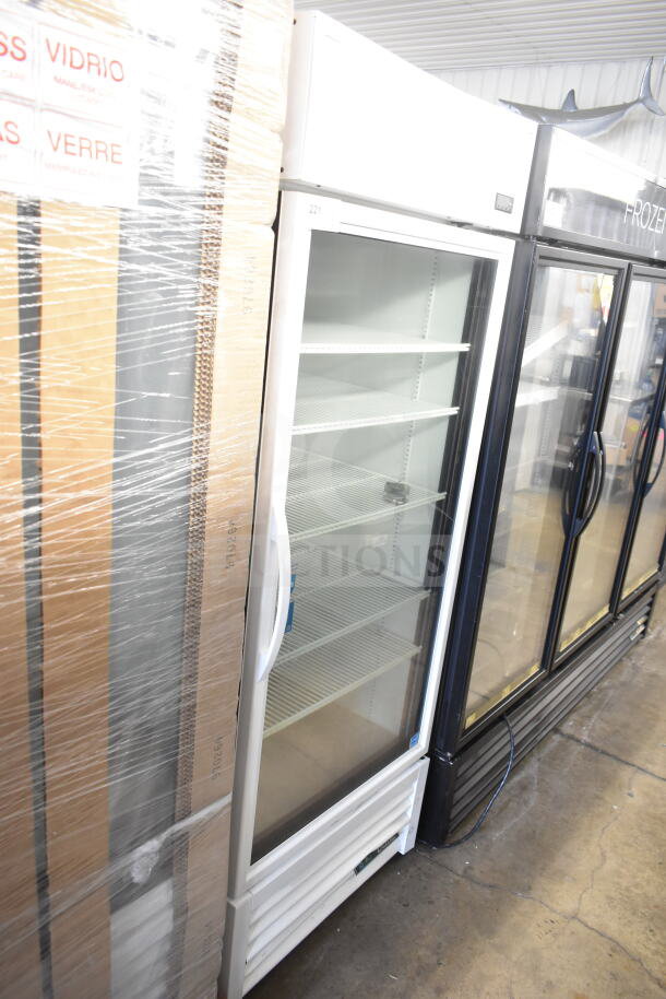 2022 True TSCI-600R-G-PH commercial single door reach-in cooler, 115 volts, 1 phase, glass door, white finish, excellent condition.