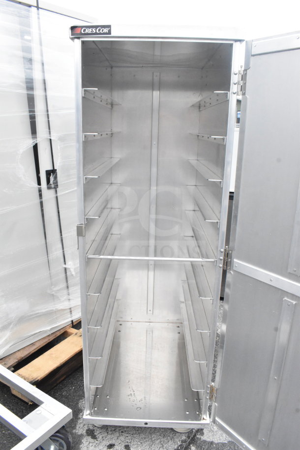 Brand new CresCor 101-1418-20 aluminum 20-tray meal delivery cart, scratch and dent. Spacious interior and durable design.