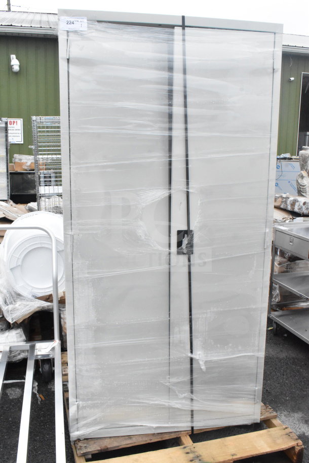 Brand new Hirsh 24"x36"x72" light gray storage cabinet with 4 shelves, assembled, scratch and dent, wrapped in plastic.