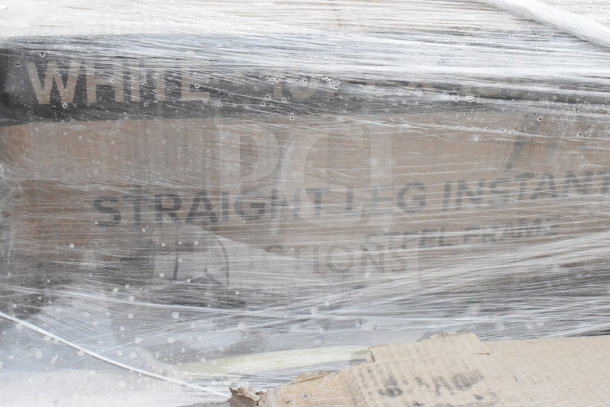 Clear wrapped pallet containing 6 new scratch and dent items, including a pop-up canopy tent and chalkboard. Marked "WHITE" and "STRAIGHT LEG INSTANT STEEL FRAME".