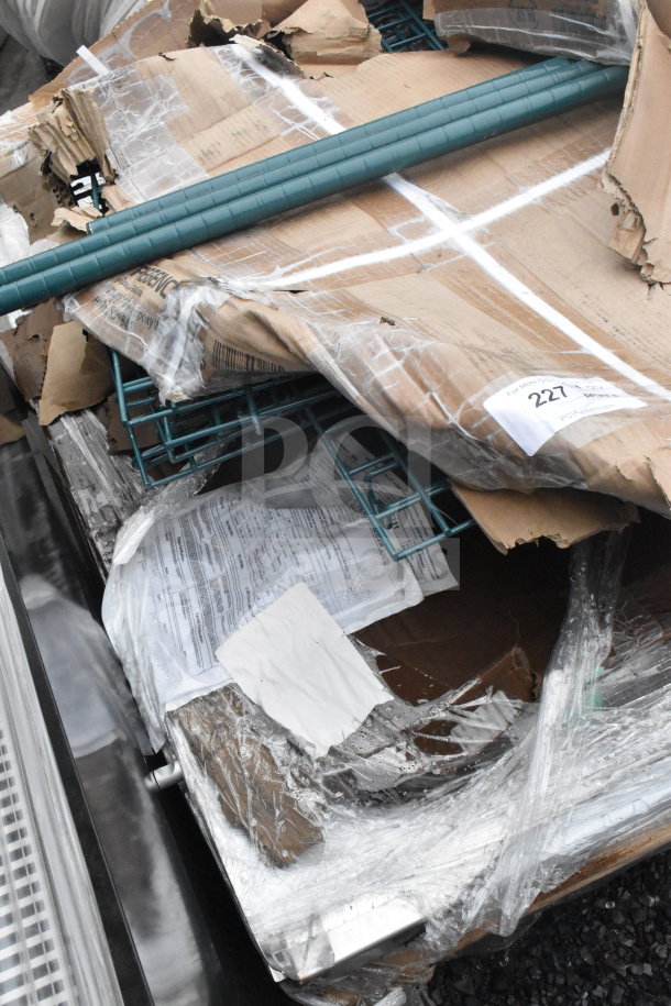 Five new scratch and dent items, including 460EC1848 chrome shelf, 18x48 inches, packed in torn cardboard and plastic wrap.