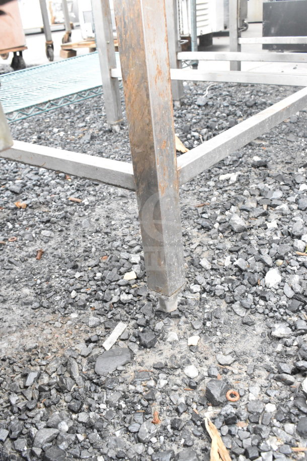 Commercial soda station with metal frame. Missing drip tray grate. Exterior shows rust and scratches. Used condition.