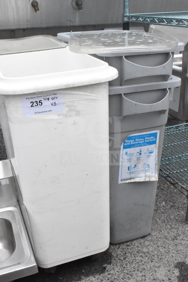 White ingredient bin and two gray trash cans. Ingredient bin has auction label "235 7/18 QTY V3" from PCIAuctions.com.