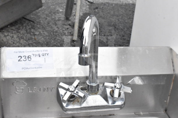 Commercial single bay wall mount sink with faucet, dual handles, and side splash guard. Features L&J NY branding.