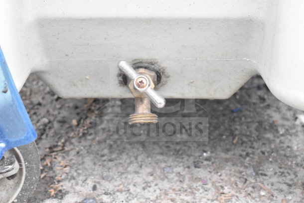 Poly portable ice bin with drain valve, commercial caster shown. Used condition, suitable for commercial use.
