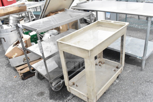 Two utility carts on commercial casters; one 3-tier metal, one 2-tier poly, showing signs of wear, ideal for heavy-duty use.