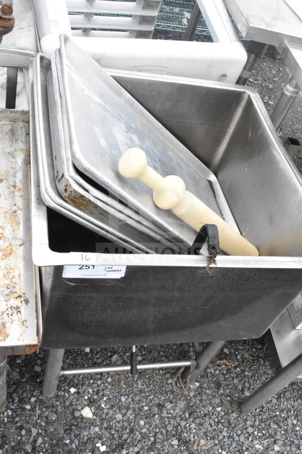 Commercial single bay ice bin with baking pans and rolling pin. Metal construction, used condition, labeled lot 251.