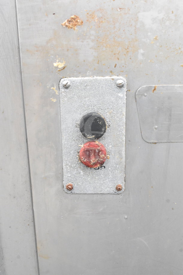 Hobart Commercial Meat Mixer Grinder with visible red and black controls on a metal panel, showing wear and rust signs.