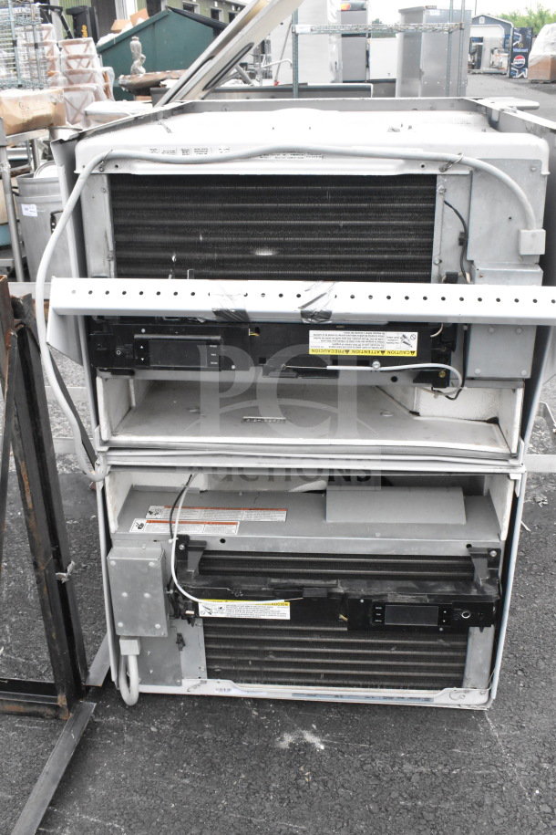 Two Friedrich KCL24A30B-A 23,000 BTU smart air conditioners, visible wiring and control panels, used condition.