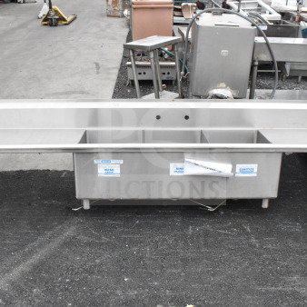 Commercial 3 bay sink with dual drain boards, no legs. Stainless steel, labels for wash, rinse, sanitize visible.