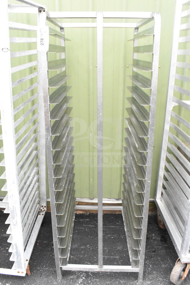 Commercial pan transport rack, aluminum construction, multiple slots for pans, sturdy and durable, excellent condition.