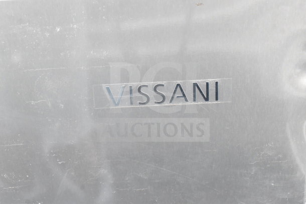 "Vissani logo on a metallic surface of a mini cooler from a set of three including Galanz and Black & Decker, 115V, 1 phase."