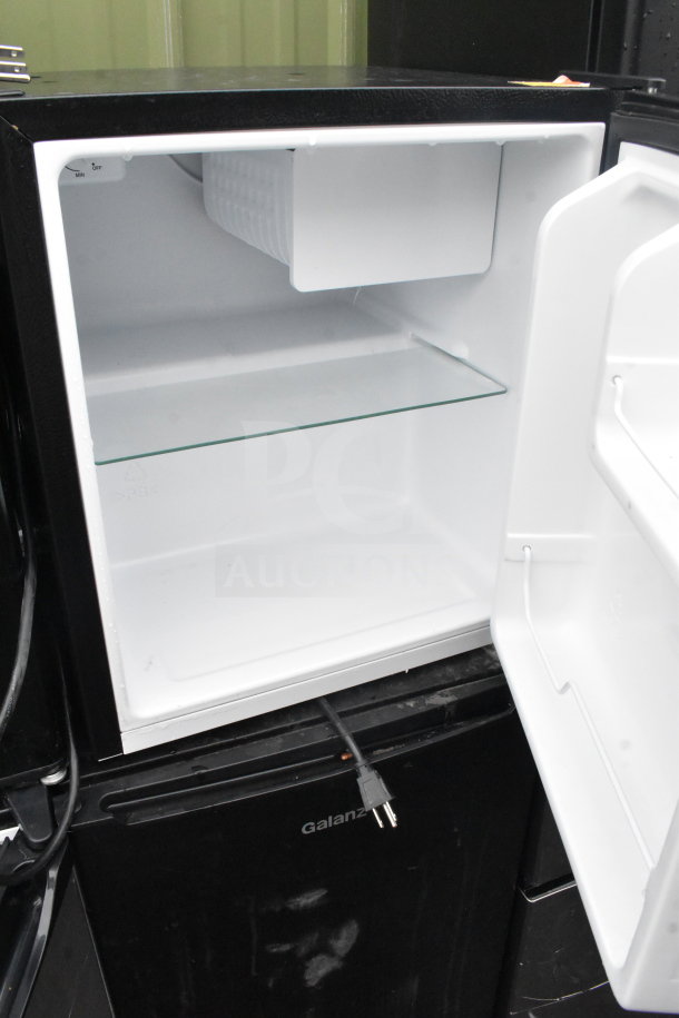 Four mini coolers including Galanz, Whirlpool, Hisense, Haier; 115 volts, 1 phase. Clean, working condition.