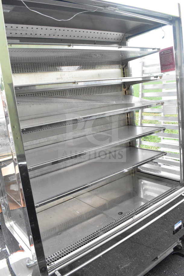 KARLOS 200 UL Commercial Reach-In Merchandiser, 230V, 1 Phase, on casters. Features multiple shelves, good condition.