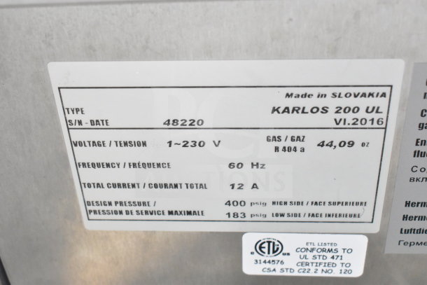 KARLOS 200 UL merchandiser label showing 230V, 1 phase, R404a gas, 60Hz, serial number 48220, ETL listed, made in Slovakia.