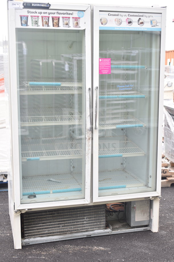 Carrier ULG50BCP-5 2 Door Reach In Freezer Merchandiser, 115/208-230V, 1 Phase. Glass doors, visible interior shelves.